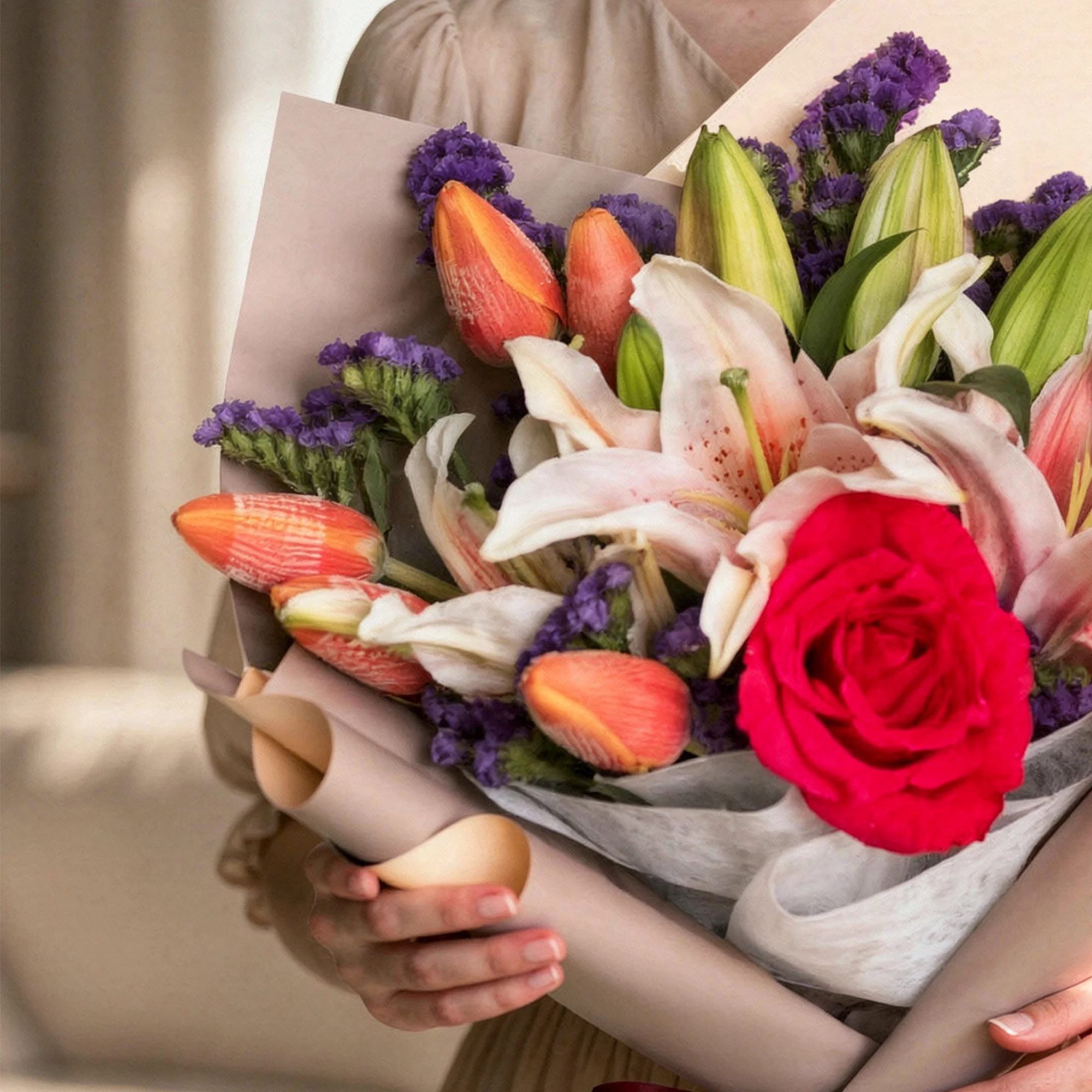 Blush Stargazer Lily and Tulip Bouquet with pink roses, carnations and purple statice