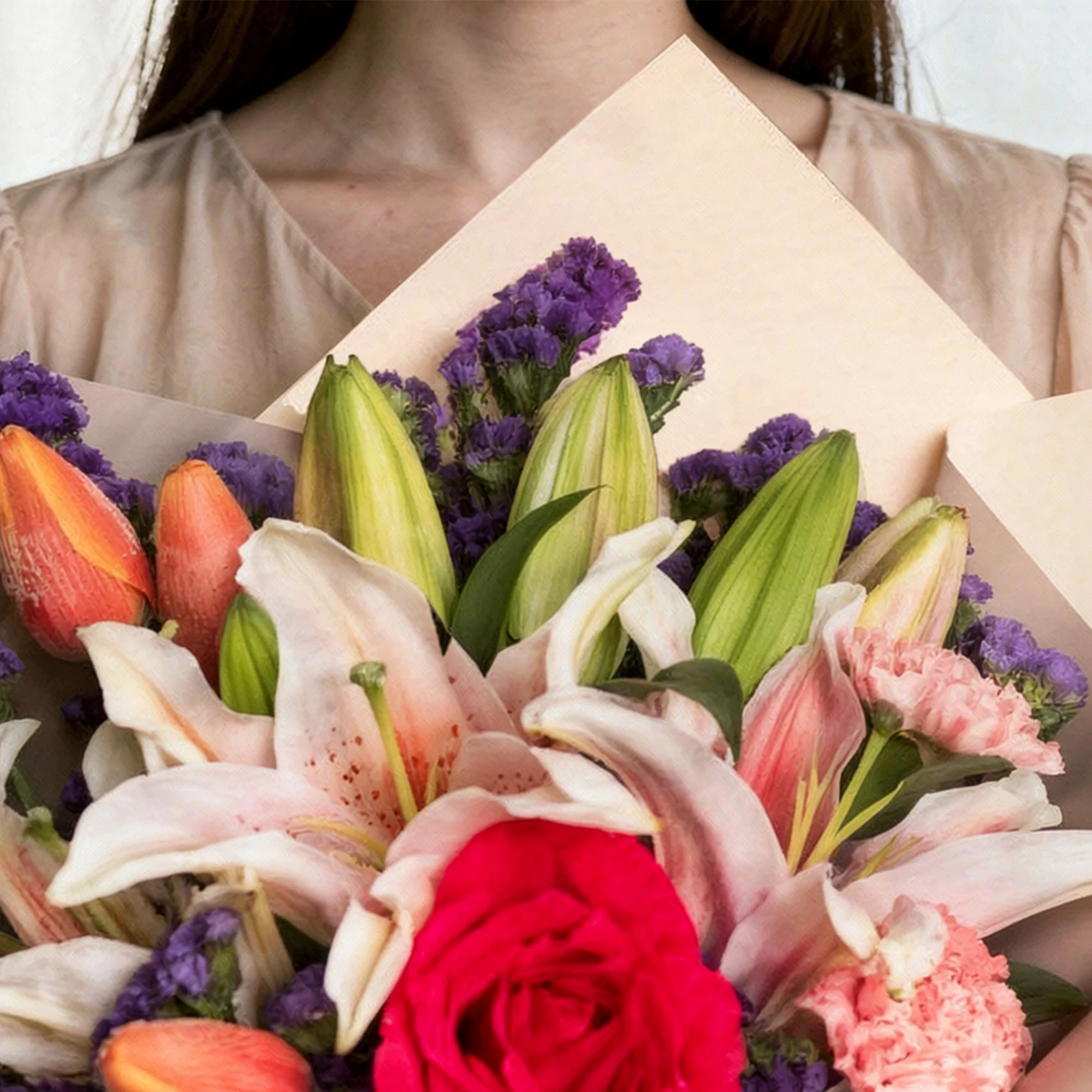 Blush Stargazer Lily and Tulip Bouquet with pink roses, carnations and purple statice