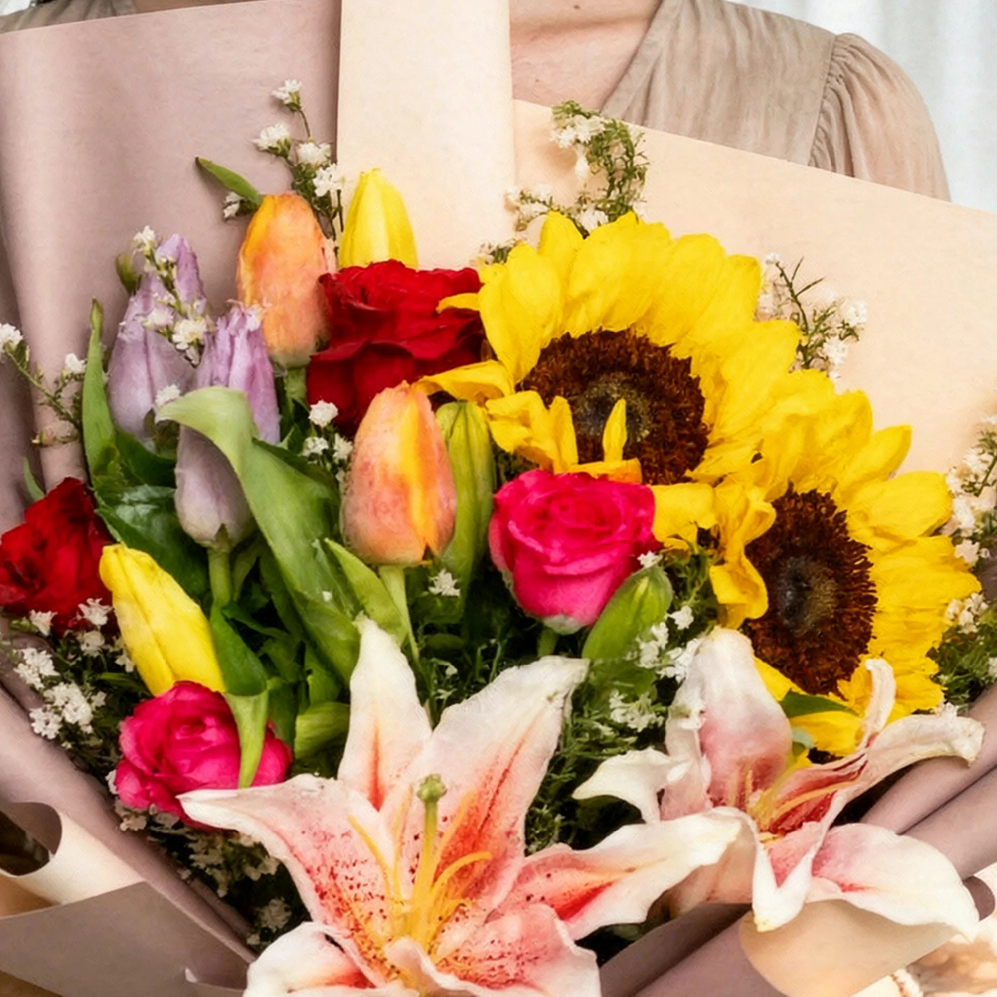 Golden Reverie Bouquet with sunflowers, roses, lilies, tulips and colourful blooms