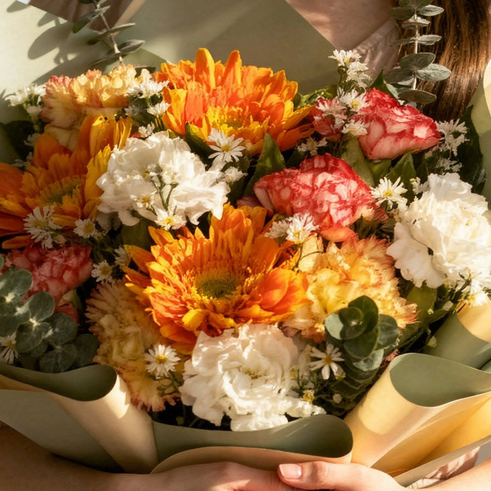 Autumn Glow Bouquet with orange flowers, roses, carnations and white filler blooms