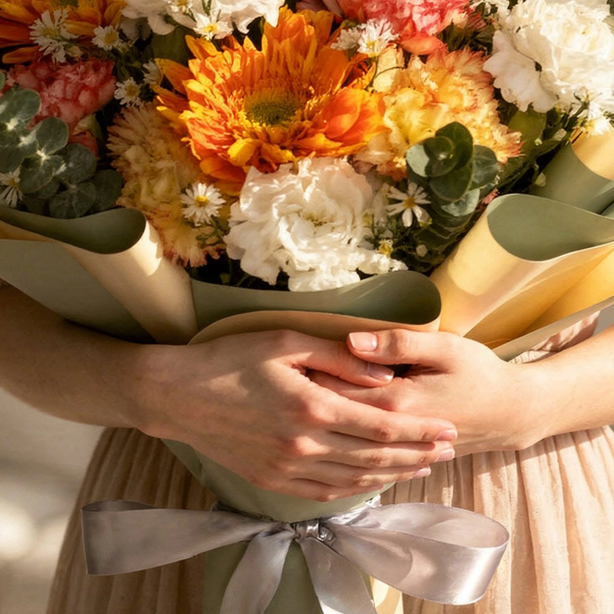 Autumn Glow Bouquet with orange flowers, roses, carnations and white filler blooms