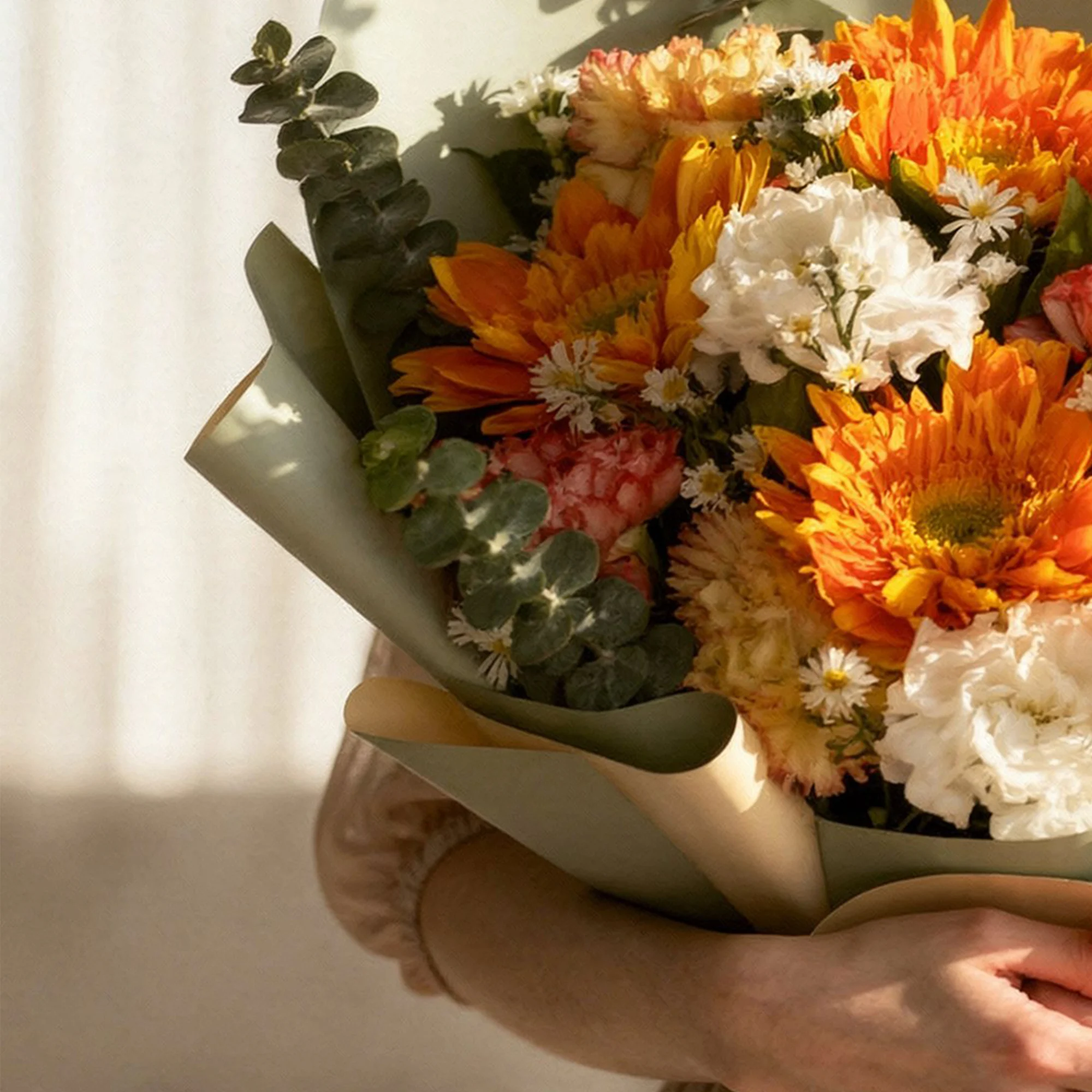 Autumn Glow Bouquet with orange flowers, roses, carnations and white filler blooms