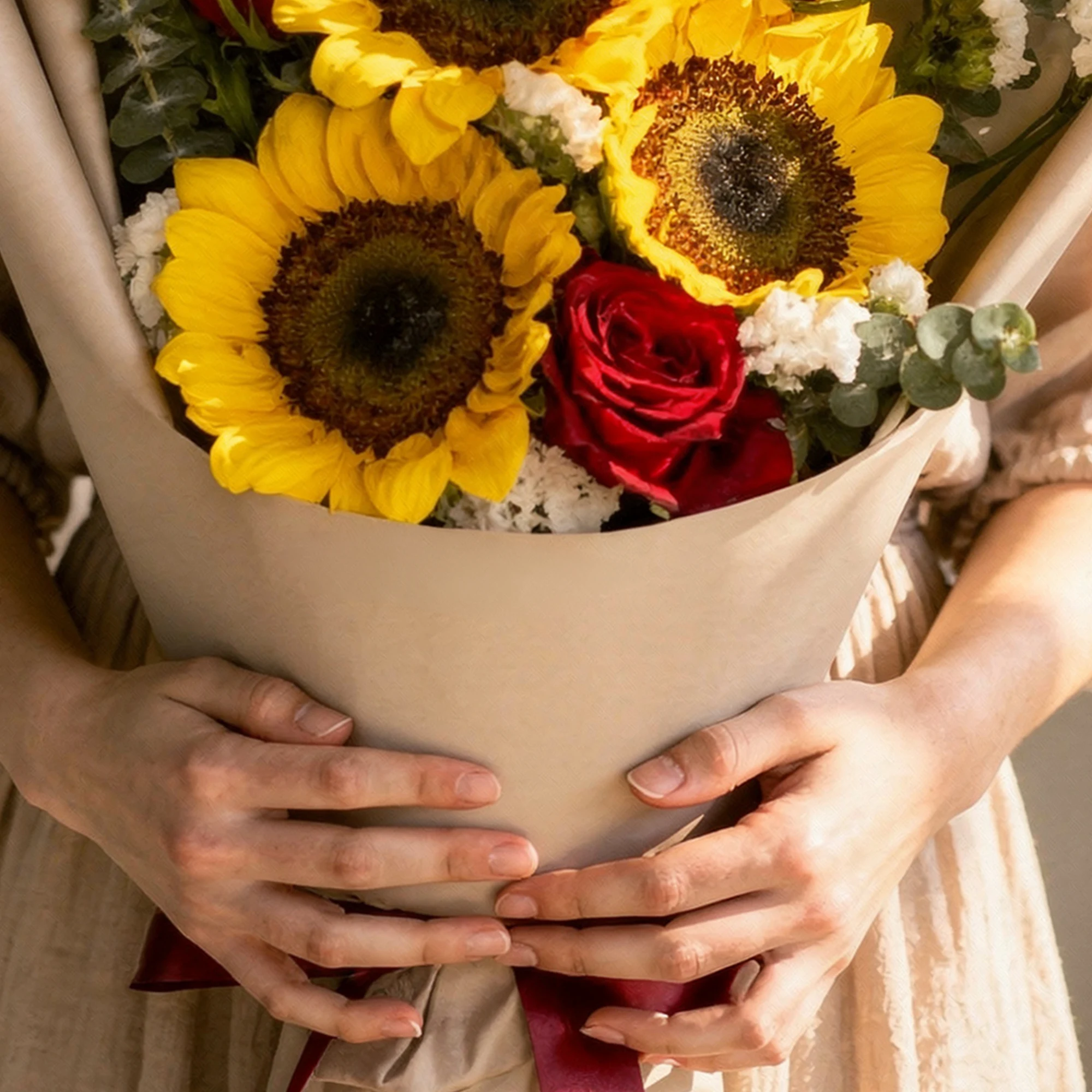 Scarlet Sunshine sunflower bouquet with red roses, white blooms and eucalyptus