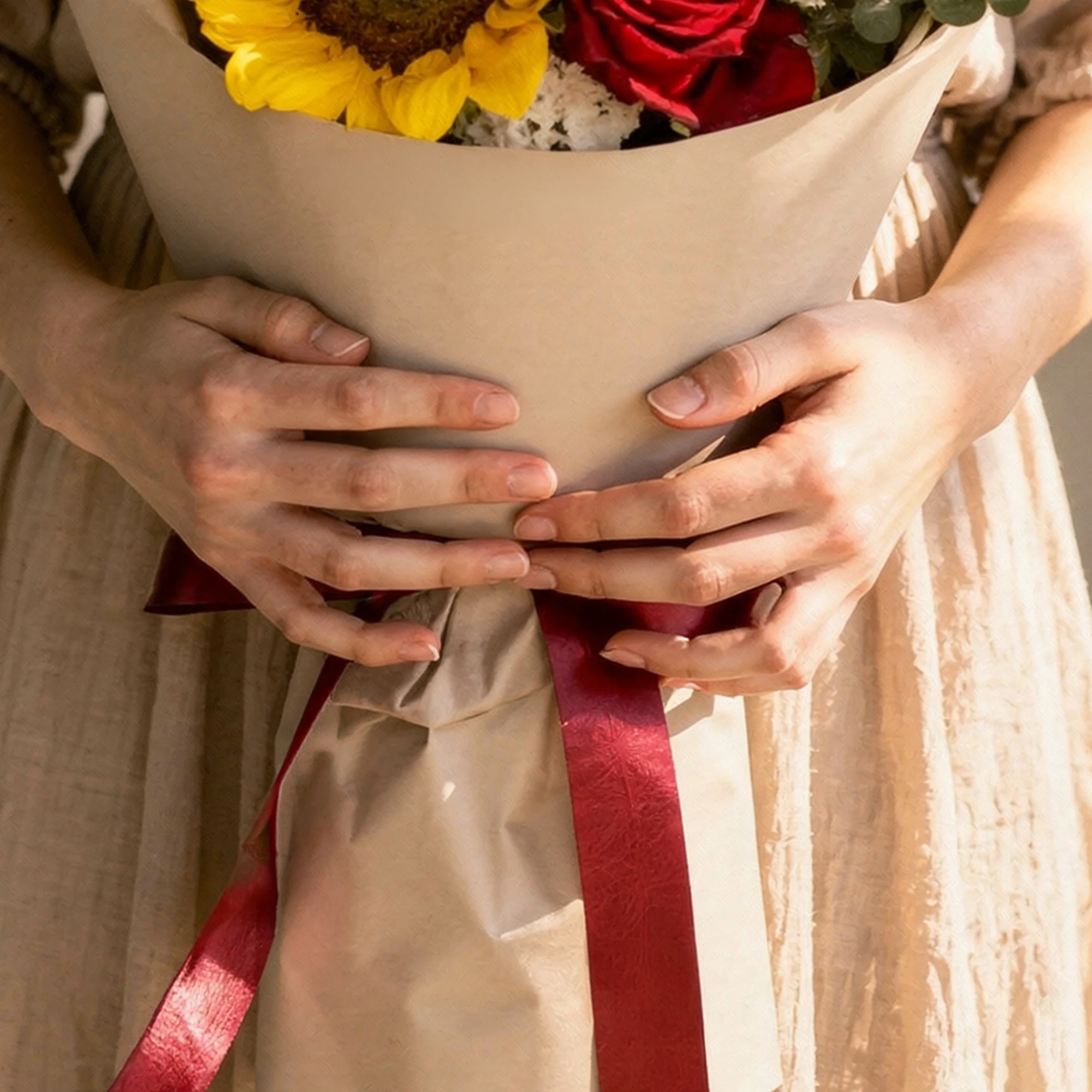 Scarlet Sunshine sunflower bouquet with red roses, white blooms and eucalyptus