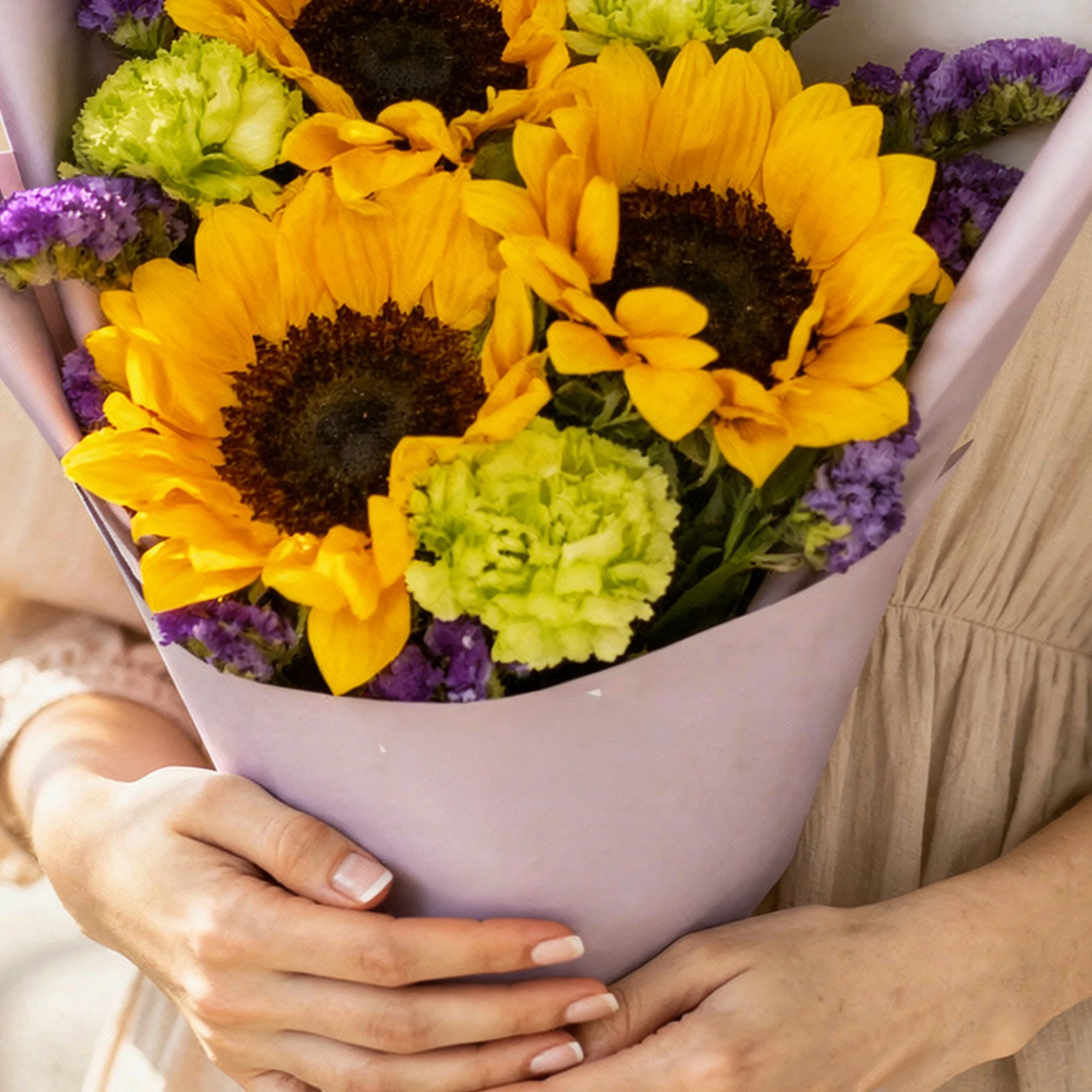 Gold Amethyst Bouquet with sunflowers, green carnations and purple flowers